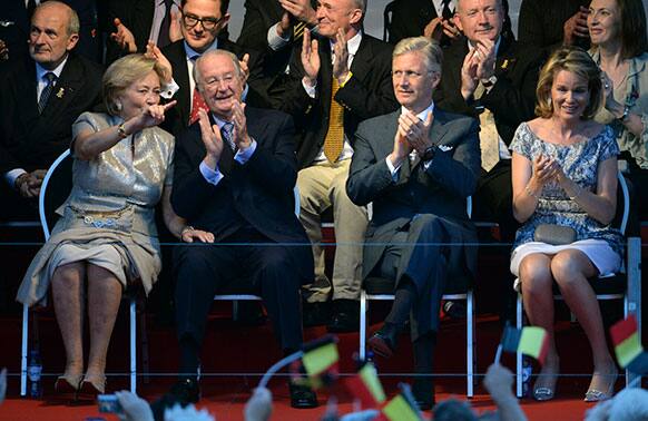 King Albert II of Belgium, second left, his wife Queen Paola, left, Crown Prince Philippe, second right, and Crown Princess Mathilde, right, attend the national ball in the Marolles district of Brussels.