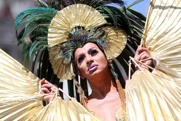 A participant celebrates Christopher Street Day (CSD) in Frankfurt , Germany. Several thousand people took part in the parade and festival to promote tolerance for homosexuals.
