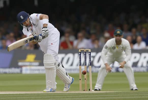 England`s Joe Root plays a shot off the bowling of Australia`s Peter Siddle during day three of the second Ashes Test match held at Lord`s cricket ground in London.