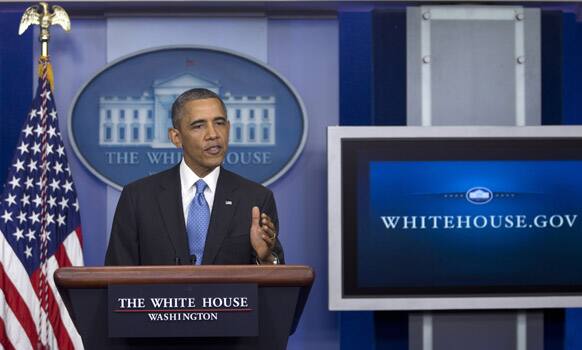 President Barack Obama gestures as he speaks at the White House, in Washington, about the fatal shooting of Trayvon Martin by George Zimmerman.