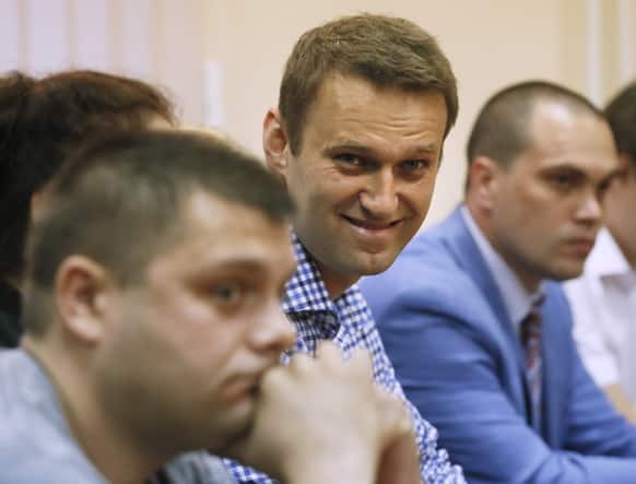 Russian opposition leader Alexei Navalny listen to judge in a court in Kirov, Russia. A Russian judge on Thursday found Navalny guilty of embezzlement, a finding that could bring the charismatic anti-corruption blogger and Moscow mayoral candidate up to six years in prison.
