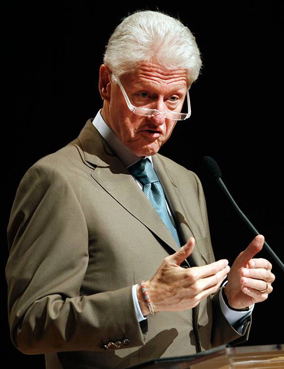 Former US President Bill Clinton talks during a forum on renewable energy in San Juan, Puerto Rico.