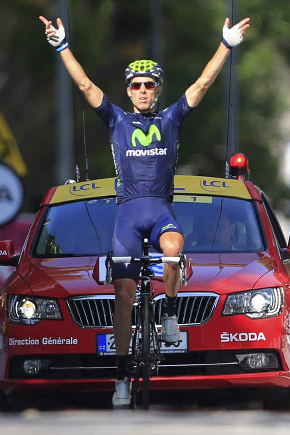 Rui Alberto Costa of Portugal celebrates as he crosses the finish line to win the sixteenth stage of the Tour de France cycling race over 168 kilometers (105 miles) with start in in Vaison-la-Romaine and finish in Gap, France.