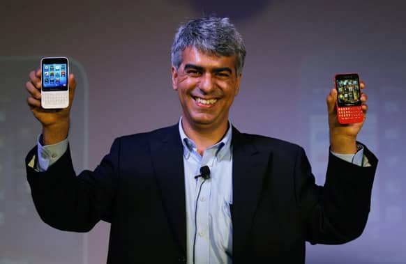 BlackBerry India Managing Director Sunil Lalwani displays BlackBerry Q5 smartphones during its launch in New Delhi. BlackBerry Q5 is priced at Rupees 24,990 ($416).