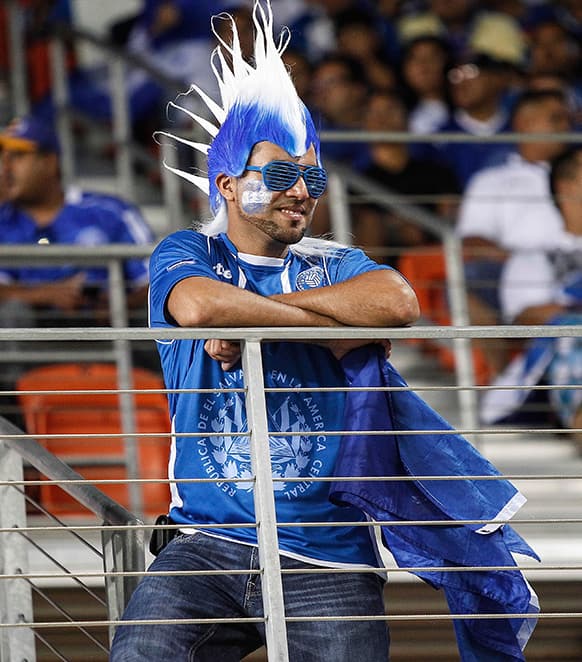 A Honduras fan looks on in the second half a CONCACAF Gold Cup soccer match, in Houston. Trinidad & Tobago defeated Honduras 2-0 .