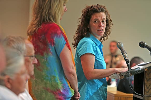 Mary Elizabeth Stotz turns toward Aaron Schaffhausen`s parents during his sentencing hearing in Hudson, Wis. Schaffhausen, who killed his three daughters last year in an act of revenge against his ex-wife, was sentenced to life in prison with no chance of parole.