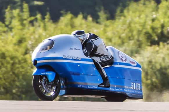 Bill Warner makes a run on his motorcycle during The Maine Event on a runway at a former air base, at Limestone, Maine. Warner, 44, of Wimauma, Fla., died Sunday after losing control and zooming off a runway on a later run.