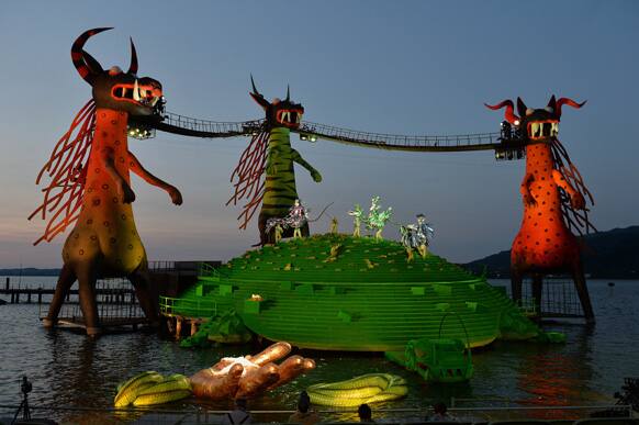 Singers and artists perform on a giant futuristic stage built into Lake Constance in Bregenz, Austria, at a rehearsal of Wolfgang Amadeus Mozart`s opera `Die Zauberfloete (The Magic Flute)`.
