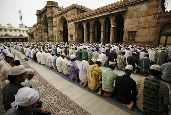 Muslims offer prayers at a mosque in Ahmadabad. Muslims throughout the world are celebrating the holy fasting month of Ramadan, refraining from eating, drinking, and smoking from dawn to dusk.