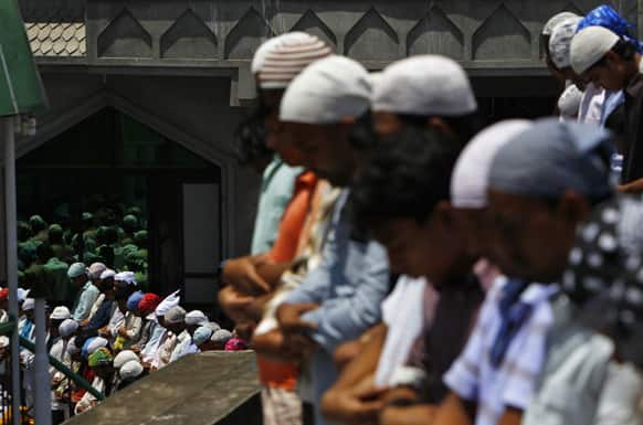 Nepalese Muslims offer prayers at a mosque in Katmandu. Muslims throughout the world are celebrating the holy fasting month of Ramadan, refraining from eating, drinking, and smoking from dawn to dusk.
