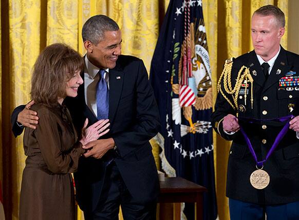 President Barack Obama awards Elaine May the 2012 National Medal of Arts for her contributions to American comedy, during a ceremony in the East Room of White House, Wednesday in Washington.