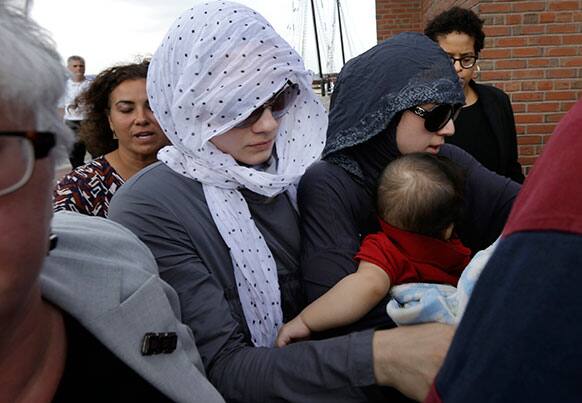 Tsarnaev family members and others depart the federal courthouse in Boston following the arraignment of Boston Marathon bombing suspect Dzhokhar Tsarnaev in Boston.