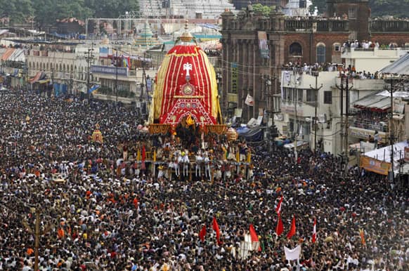Devotees throng around the chariot of Lord Jagannath during the annual Rath Yatra or chariot procession in Puri, 60 kilometers (37 miles) from the eastern Indian city of Bhubaneswar.