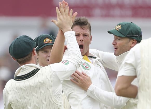 Australia`s bowler James Pattinson celebrates taking the wicket of England captain Alastair Cook during day one of the First Ashes Test match of the series at Trent Bridge, Nottingham, England.
