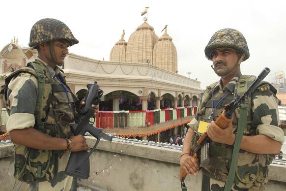 Indian Border Security Force(BSF) soldiers stand guard at the Lord Jagannath temple ahead of annual Rath Yatra or Chariot procession, in Ahmadabad.