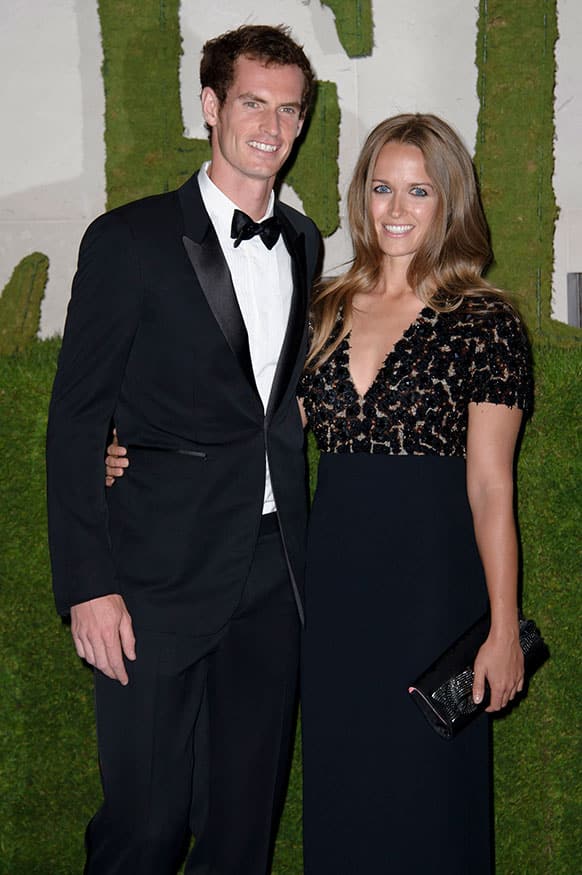 British tennis player and winner of Wimbledon 2013 Andy Murray and his partner Kim Sears arrive for the Wimbledon Champions Dinner 2013, in London.