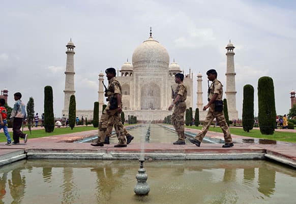 Indian paramilitary soldiers patrol the premises of the Taj Mahal in Agra, after a series of blasts in Bodhgaya.