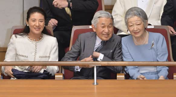 Japanese Emperor Akihito, center, Empress Michiko, right, and Crown Princess Masako, left, watch a concert of the Gakushuin university`s alumni in which Crown Prince Naruhito plays the viola at Tokyo Metropolitan Theatre in Tokyo.