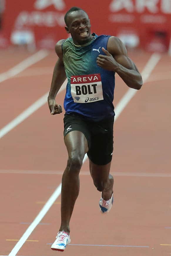 Usain Bolt of Jamaica competes to win the Men`s 200m during the Athletics Diamond League meeting at Stade de France stadium in Saint Denis north of Paris.