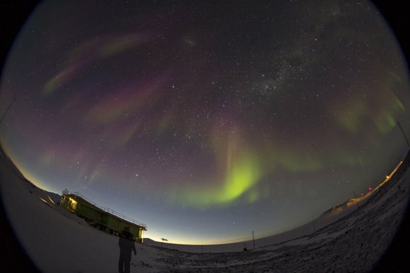aurora is seen from the Arrival Heights laboratory near Antarctica New Zealand`s Scott Base. Aurora australis, also called the southern lights, is an effect believed to be caused by atomic particles entering the atmosphere.