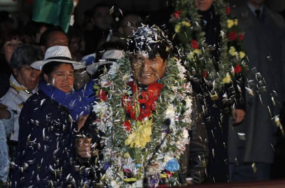 Bolivia`s President Evo Morales is welcomed upon his arrival home after an unplanned 14-hour layover in Vienna at the airport in El Alto, Bolivia.