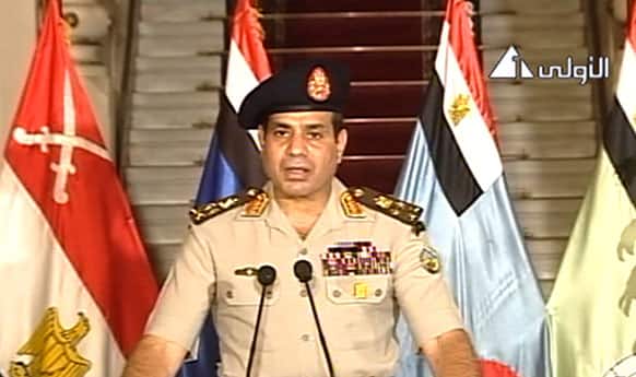 This image made from video shows Lt. Gen. Abdel-Fattah el-Sissi addressing the nation on Egyptian State Television. Egypt`s military chief says president is replaced by chief justice of constitutional court.