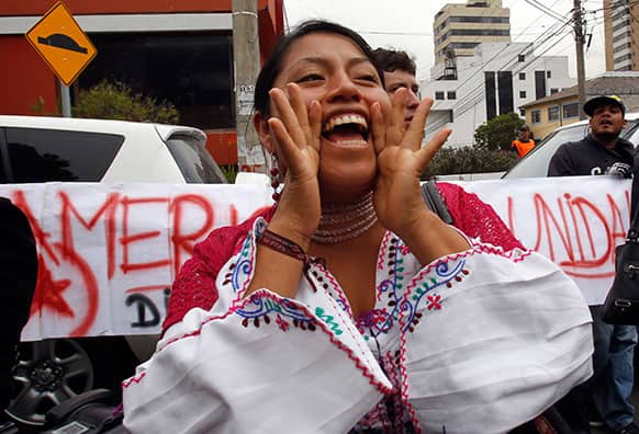 A Zuleta indigeneous woman shouts in support of Bolivia`s President Evo Morales in front of the Spanish Embassy protesting over various European countries` alleged refusal to let the Bolivian president`s plane cross over their airspace, in Quito, Ecuador.