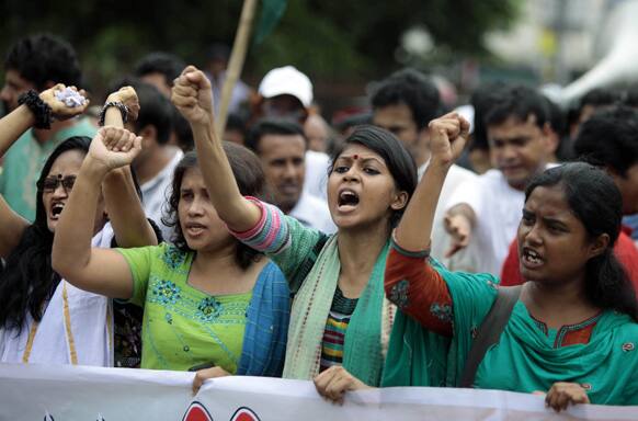 Bangladeshi activists shout slogans at a protest against a nationwide strike called by Islamic party Jamaat-e-Islami on the outskirts of Dhaka, Bangladesh.