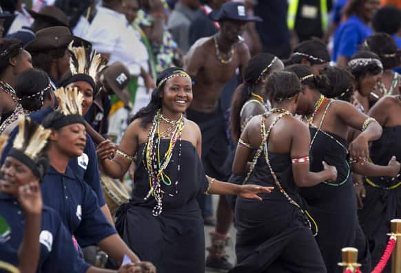 Dancers rehearse at a departure ceremony ahead of the arrival of US President Barack Obama and First Lady Michelle Obama at the end of the final leg of their weeklong visit to Africa, at the Julius Nyerere airport in Dar es Salaam, Tanzania.