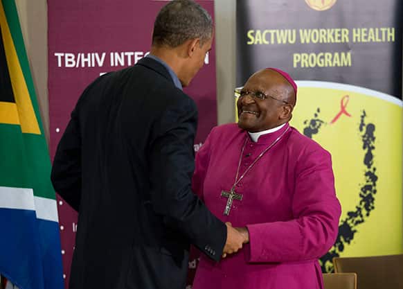 US President Barack Obama, left, talks with Bishop Desmond Tutu during a visit to the Demond Tutu HIV Foundation Youth Center in Cape Town, South Africa.