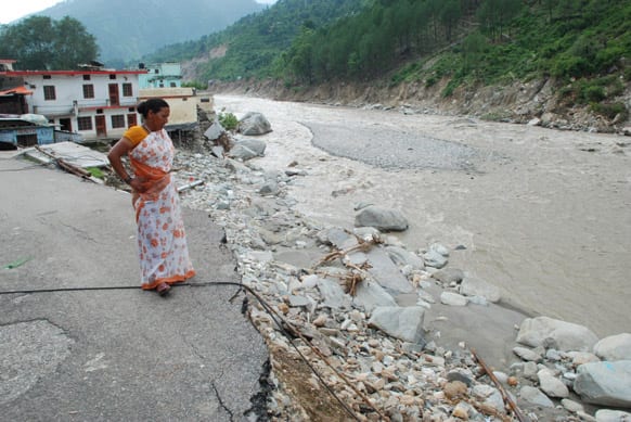 A local looks on hopelessly at the destruction that has unfolded at Rudraprayag. Photo Courtesy: Siddharth Behl/SEEDS