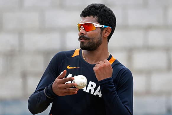 India`s Ravindra Jadeja prepares to bowl in the nets during a training session in Kingston, Jamaica, Saturday, June 29, 2013. India will face the West Indies in a Tri-Nation Series cricket match.