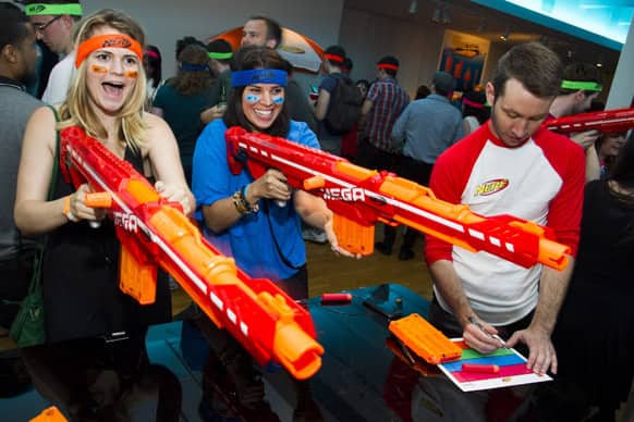 Guests try out the new NERF N-STRIKE ELITE CENTURION blaster from Hasbro at the Nerf brand’s annual press party, in New York.