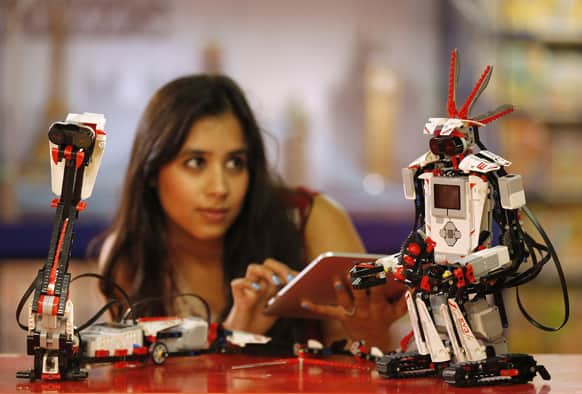 A Hamleys employee steers the Lego Mindstorms EV3 with an iPad application at the toy store Hamleys in London.