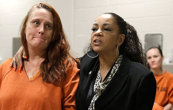 Kathryn Griffin Grinan, right, hugs Harris County jail inmate Tricia Chambers, as they talk about Chambers` life in prostitution in Houston. Griffin developed and runs the prostitution rehabilitation program We`ve Been There Done That.
