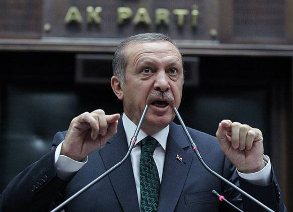 Turkish Prime Minister Recep Tayyip Erdogan addresses the members of his Islamic-rooted party in parliament in Ankara, Turkey.