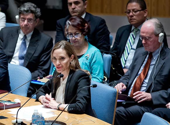 Actress Angelina Jolie makes her debut before the Security Council at the UN headquarters as a special envoy for refugees to urge the world`s nations to make the fight against rape in war a top priority.
