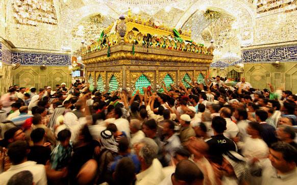 Shiite Muslim worshippers gather at the holy shrine of Imam Abbas during the annual festival of Shabaniyah, which marks the anniversary of the birth of the ninth-century Shiite leader known as the Hidden Imam, in Karbala.