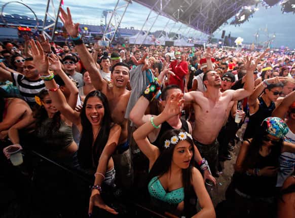 Festival-goers dance to Clockwork at the Circuit Grounds stage at the Electric Daisy Carnival at the Las Vegas Motor Speedway, in Las Vegas.