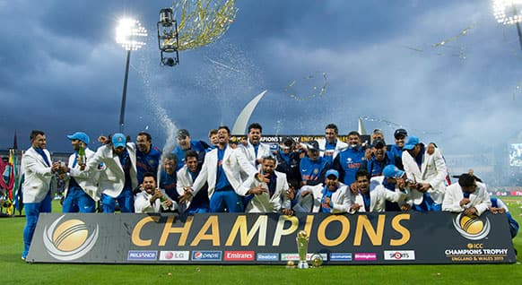 India`s players celebrate winning the ICC Champions Trophy Final cricket match against England at Edgbaston cricket ground, Birmingham, England.