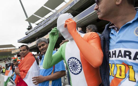 Fans wait for play before the team`s ICC Champions Trophy Final cricket match against England at Edgbaston cricket ground, Birmingham, England.