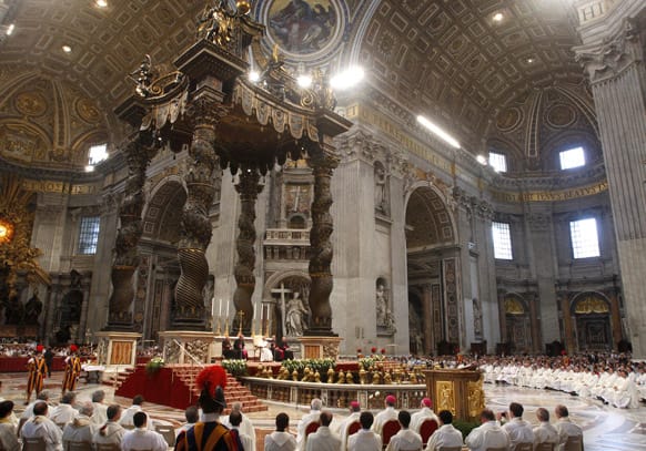 Pope Francis speaks to faithful at the end of a Mass celebrated by Brescia`s Bishop Luciano Monari, not pictured, in St. Peter`s Basilica at the Vatican.