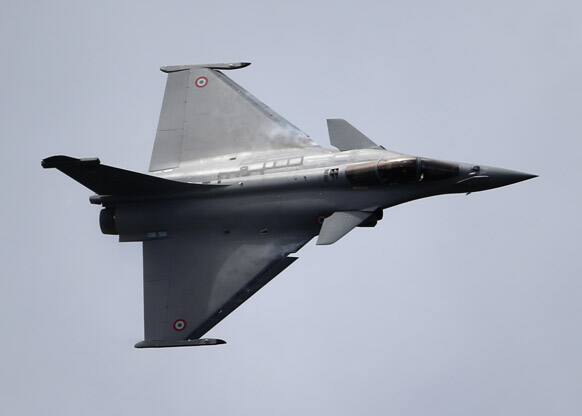 A French Air Force Rafale jetfighter performs its demonstration flight during the 50th Paris Air Show at Le Bourget airport, north of Paris.