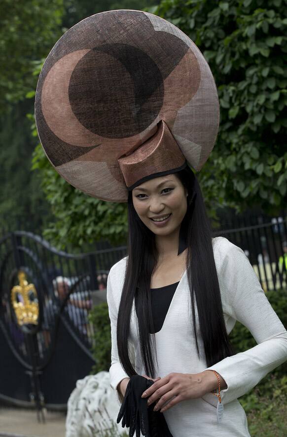 Wei Lin from Taiwan wears an ornate hat on the third day traditionally known as Ladies Day of the Royal Ascot horse race meeting in Ascot, England.