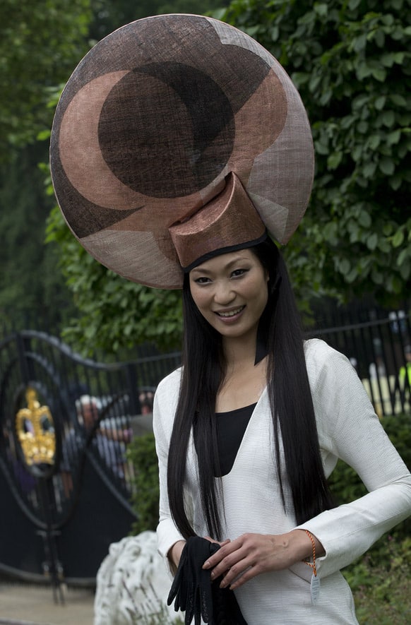 Wei Lin from Taiwan wears an ornate hat on the third day traditionally known as Ladies Day of the Royal Ascot horse race meeting in Ascot, England.