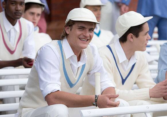 Models wear creations by Savile Row & St James`s designers at a fashion installation during London Men`s spring summer fashion collections 2014, at Lord`s cricket ground, in London.