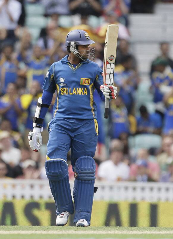Sri Lanka`s Lahiru Thirimanne celebrates getting fifty runs not out against Australia during their ICC Champions Trophy cricket match at the Oval cricket ground in London.