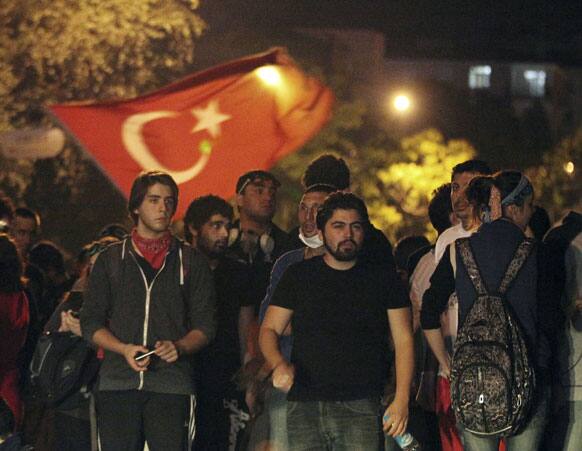 Turkish protesters hold a massive rally on John F. Kennedy street near the US Embassy, in Ankara.