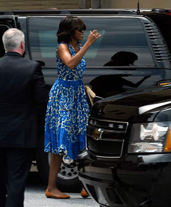 First lady Michelle Obama arrives at the Strathmore Music Center in Bethesda., Md., to attend daughter Sasha Obama`s recial.