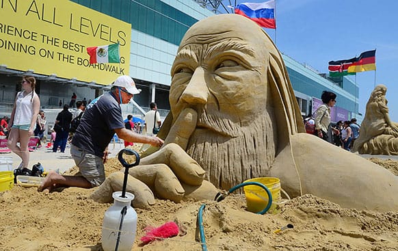 Sculptor Matt Long of Staten Island New York, an original cast member of the Travel Channel TV show, `Sand Masters,` works on his entry, during the World Championship of Sand Sculpting on the beach next to the Pier at Caesars in Atlantic City, N.J.